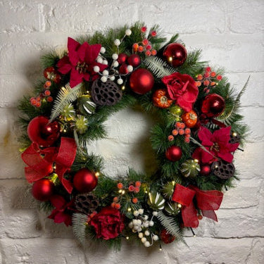 Artificial Christmas door wreath with lights